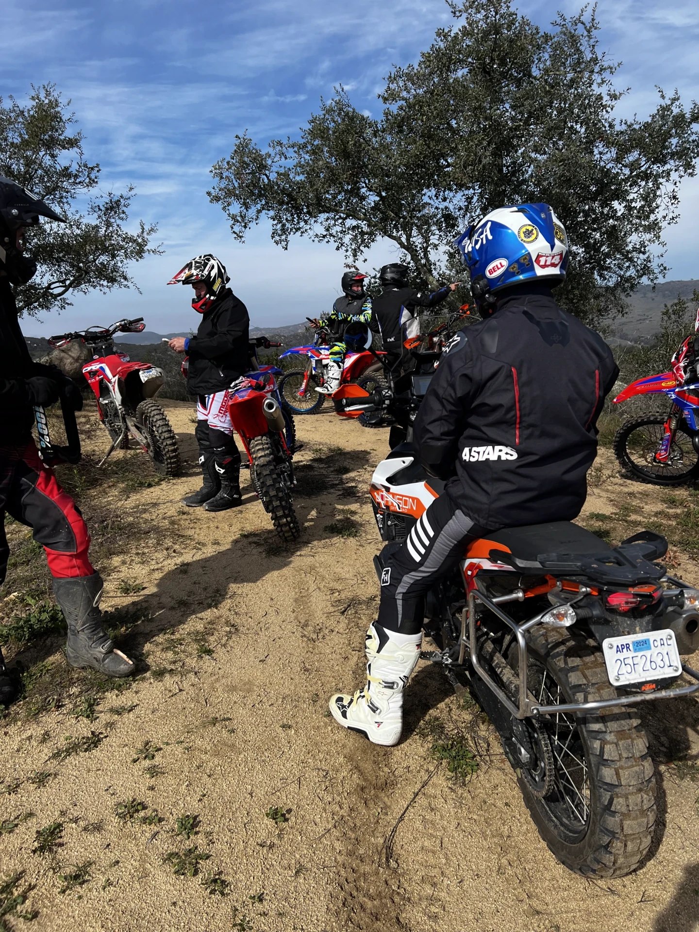 Riders regrouping at a trail lookout