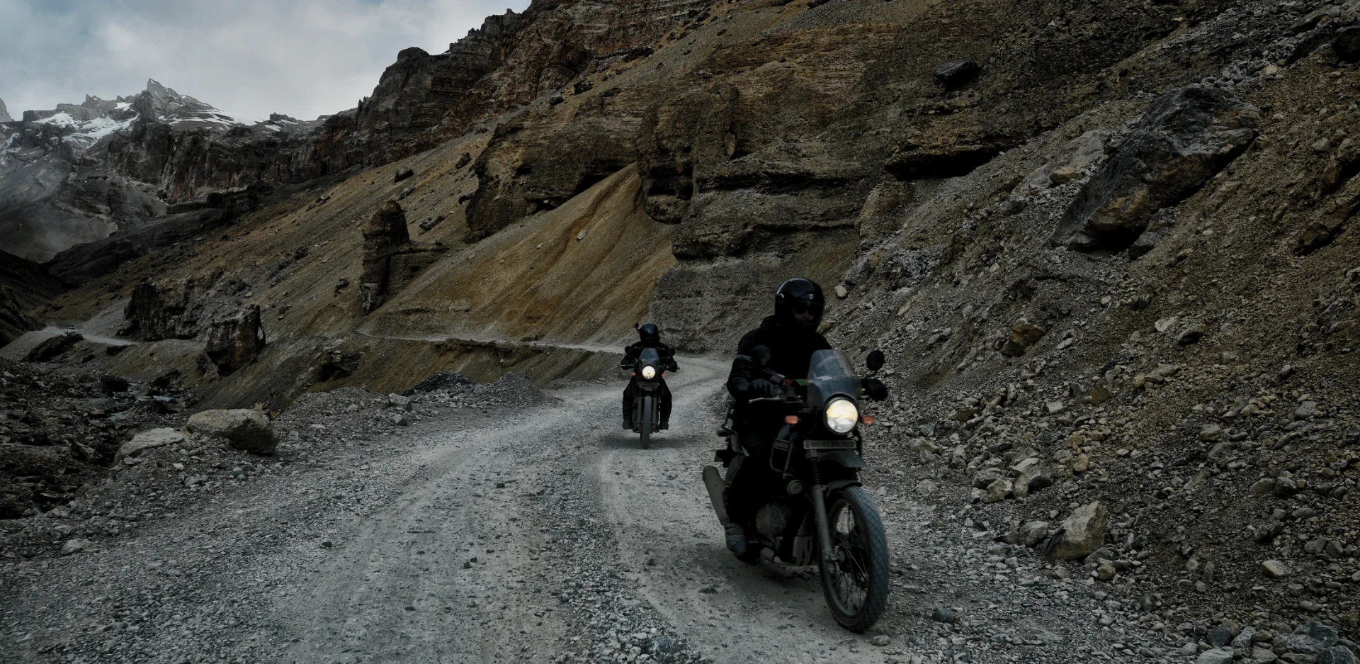 Adventure riders on a high mountain road